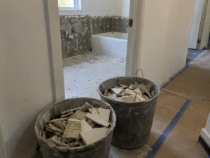 Bathroom tile debris collected for handling